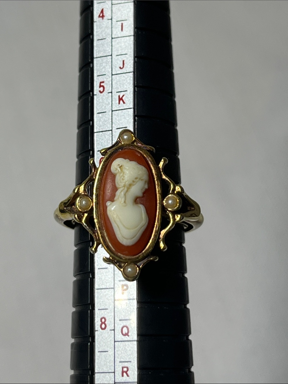 Vintage Avon gold cameo ring with adjustable sizing. Adjustable Size 7-8